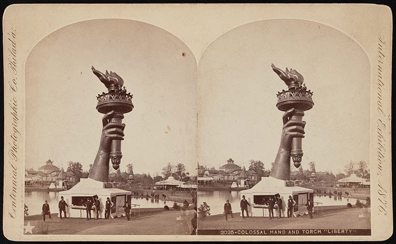 Right hand and torch of the Statue of Liberty, sculpted by Frédéric Auguste Bartholdi, on display at the Philadelphia Centennial Exhibition, stereocard, 1876 (atlasobscura.com)