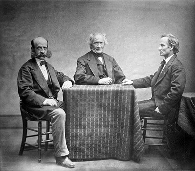 The three partners of Alvan Clark & Sons, with father Alvan Clark in center, younger son Alvan Graham Clark at left, and older son George Bassett Clark at right (Wikimedia commons)