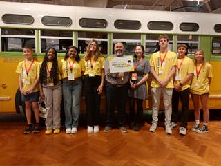 KCIC's US Nationals Contingent flank Programs Coordinator Kristina Gabuardy and Public Programs Manager Matt Reeves