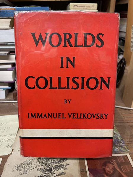 Dust jacket of Worlds in Collision, by Immanuel Velikovsky, Macmillan Co., 1st ed., 1950, a copy offered for sale by Chamblin Bookmine (chamblinbookmine.com)