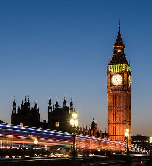 Elizabeth Tower, its clock, and the Palace of Westminster at sunset, recent photograph (Wikimedia commons)
