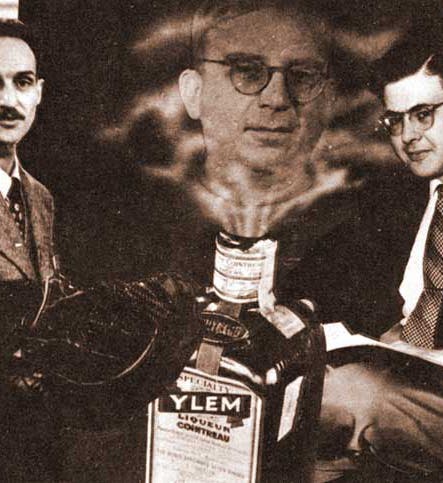 Gag photo concocted by George Gamow, showing Ralph Alpher (right), Robert Herman (left), with Gamow emerging from a Cointreau bottle that has been relabeled “Ylem,” their name for the primordial stuff of the universe (history.aip.org)