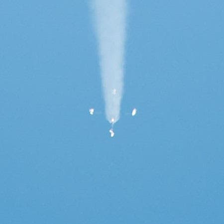 The “Korolev Cross,” formed when the four booster rockets of the R-7 fall away after launch (Wikimedia commons)