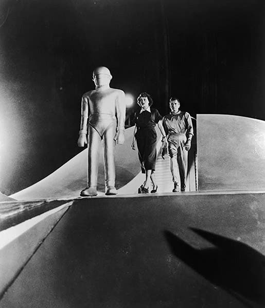 Gort (Lock Martin), Helen Benson (Patricia Neal) and Klaatu (Michael Rennie), a still from The Day the Earth Stood Still, 1951 (imdb.coom)