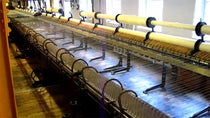 A working self-acting spinning mule at Quarry Bank Mill, frame from a video (Wikimedia commons)