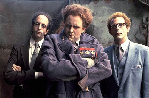 Three Red Lectroids (left to right): John O’Connor, John Whorfin ( inhabiting Emilio Lizardo), and John Bigbooté, played by Vincent Schiavelli, John Lithgow, and Christopher Lloyd, respectively (bulletproofaction.com)