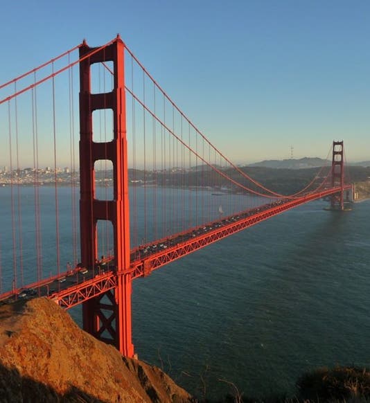 The Golden Gate Bridge, looking south, towers in shadow (blomberg.com)