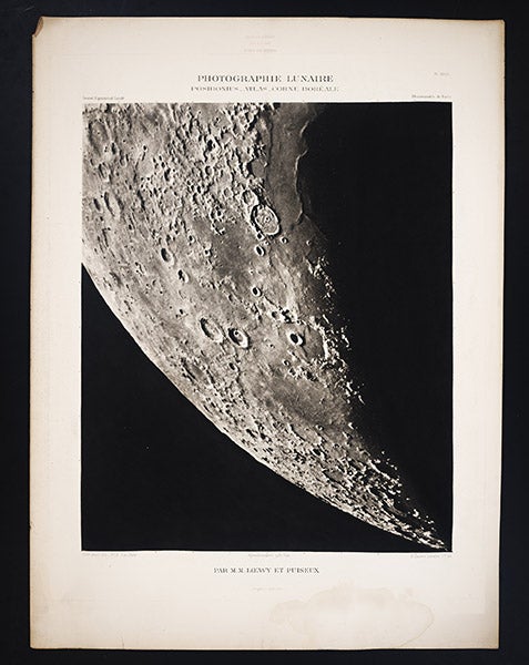 The northern horn of the new moon (north is down), with the crater Posidonius at the edge of the shadowed Sea of Serenity. The twin craters right next to each other below and to the left of Posidonius are Atlas and Hercules, Atlas Photographique de la Lune, Maurice Loewy and Pierre Henri Puiseux, 1896-1910, plate 28, taken Apr. 26, 1898 (Linda Hall Library)