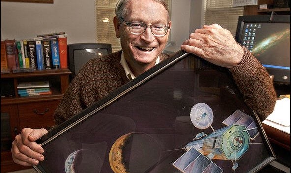 Photo of space pioneer Jerome Pearson holding rendering of space elevator concept. Photo credit; Wade Spees for the Washington Post