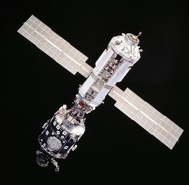 The entire ISS as of December 1998, consisting of just two modules, the Russian Zarya (top, with solar panels), and Unity, below, NASA photo (Wikimedia commons)