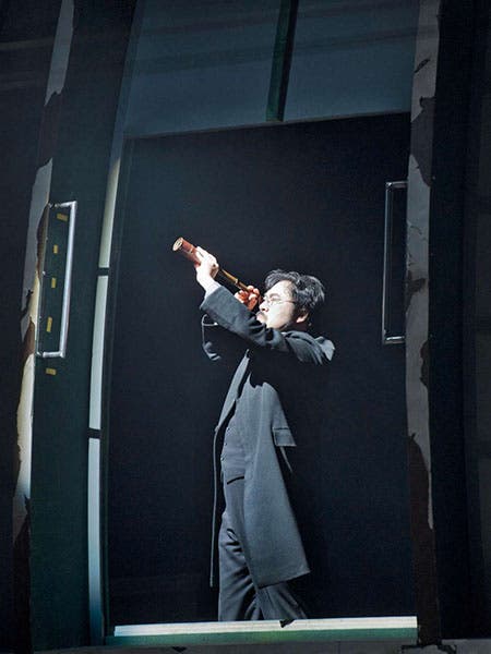 Johannes Kepler in his observatory, from the 2017 production of Die Harmonie der Welt, by Paul Hindemith, Linz, Austria (bachtrack.com)
