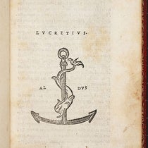 The printer’s mark of the Aldine Press, a dolphin and anchor, with the motto (implied here): festina lente – make haste slowly – in the Aldine edition of Lucretius, De rerum naturae, 1515 (Linda Hall Library)