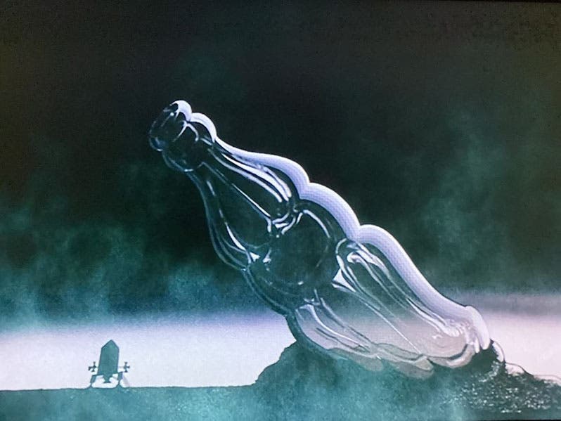 Opening scene, a Coke bottle on an alien planet getting evolution started, still from Allegro non tropo, by Bruno Bozzetto, 1976; issued on DVD by Home Vision Entertainment, 2003 (homevision.com)