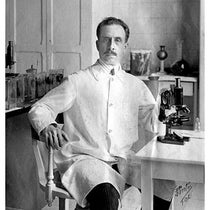 Carlos Chagas in the lab with his Zeiss microscope, photograph, unknown date (Wikimedia commons)