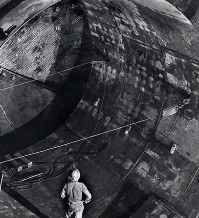Raymond Davis Jr. observing the construction of the large (390,000 liter) tetrachloroethylene tank at the 4850-foot level of the Homestake Mine, Lead, South Dakota, photograph, ca 1961? (sanfordlab.org)