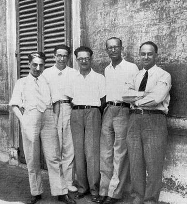 Enrico Fermi (far right) and his collaborators in Rome, including Emilio Segrè, second from left <br>(Wikimedia Commons)