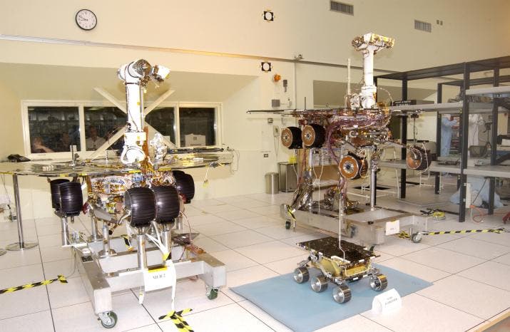 Mars-bound rovers Opportunity and Spirit posing with the backup of Sojourner at Jet Propulsion Labs, 2003