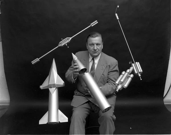 Krafft Ehricke with models of some of his proposed spacecraft, 1957 (thespacereview.com)