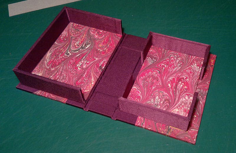 A Solander box, or clam-shell box, for storage of books, collectibles, or, in this case, playing cards (Armand K on flickr)