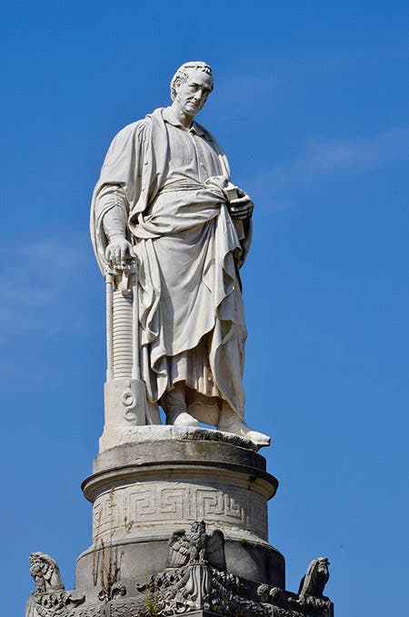Statue of Alessandro Volta in the square in Como, Italy; note the Voltaic pile beneath his right hand (pxfuel.com)