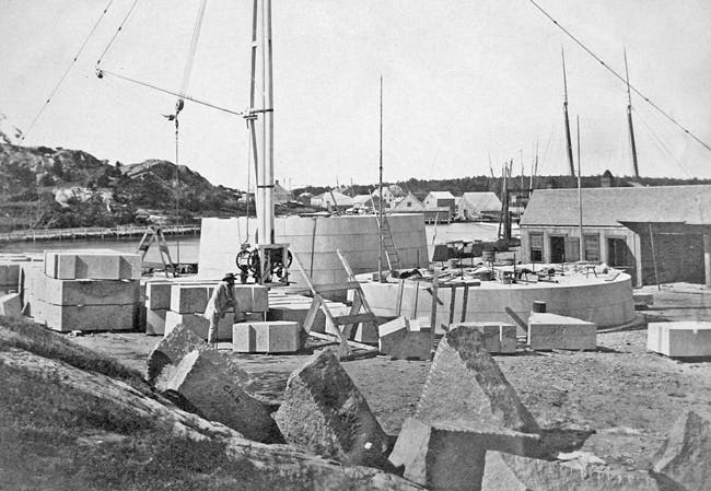 Granite blocks for the Minot’s Ledge Lighthouse being assembled on Government Island, Cohasset, Mass., 1856? (lighthousefriends.com)