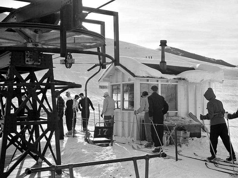 Line of skiers waiting to get on one of the original Curran chair lifts at Sun Valley, Idaho, 1940s? (smithsonianmag.com)