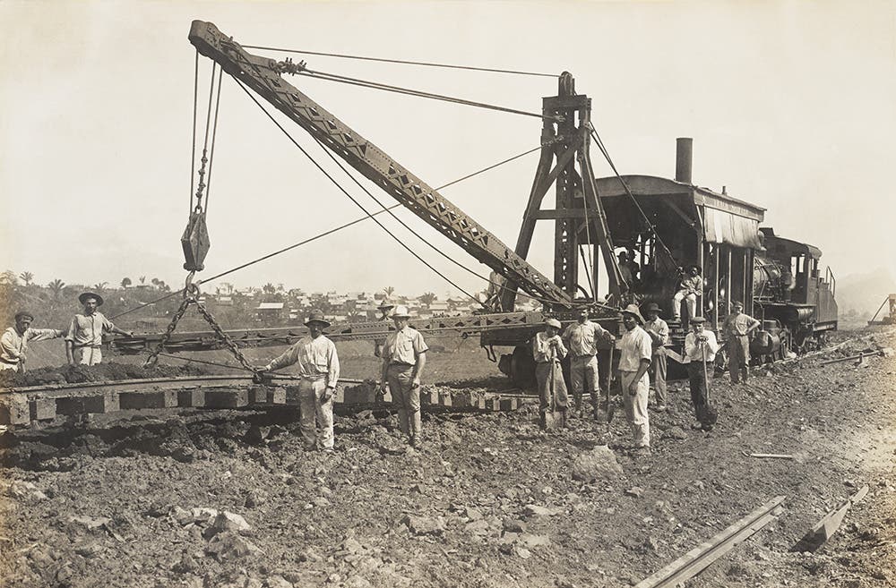 A track shifter moves rails to a new dump location after an area reaches capacity.
View in Digital Collection »