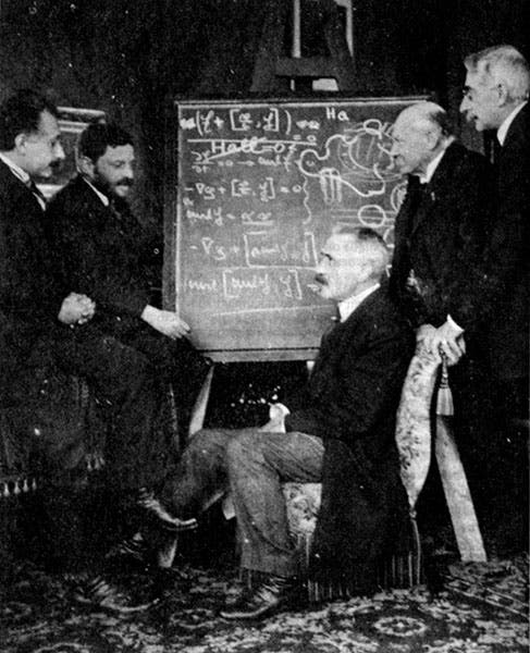 Paul Langevin, seated, in the house of Heike Kamerlingh Onnes (second from right); Albert Einstein is at far left, Paul Ehrenfest is next to him, with Pierre Weiss at far right; photograph, 1920? (Wikimedia commons)
