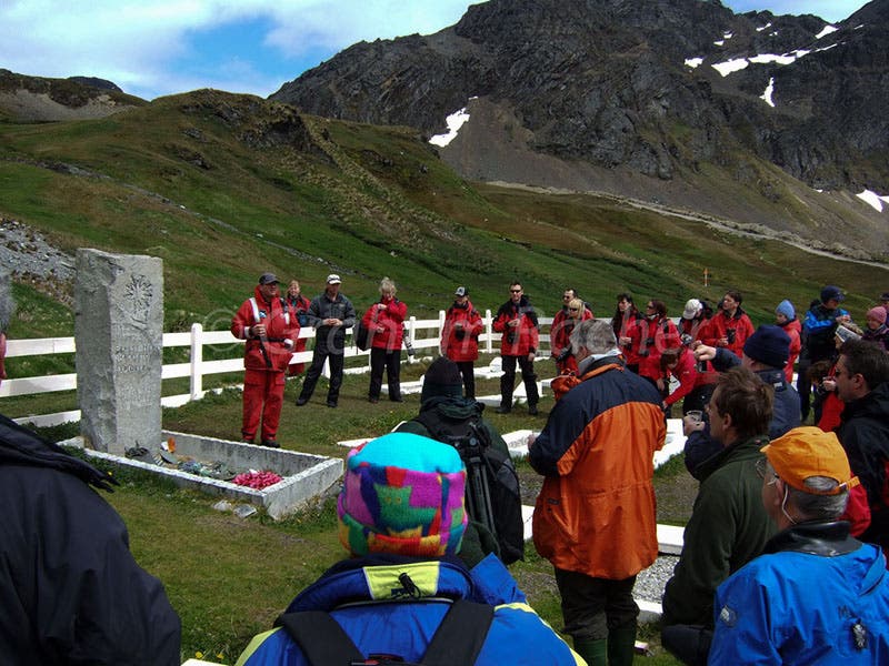 Visitors at the grave of Shackleton, South Georgia Island (Graham Racher on Flickr)