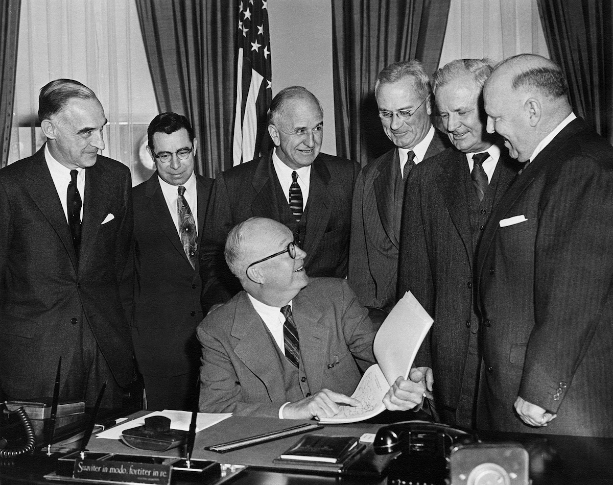 President Eisenhower reviews a map of proposed federal highway system presented by General Lucius Clay, far left, and his Advisory Committee. Photo courtesy Dwight D. Eisenhower Presidential Library & Museum.
