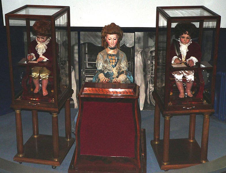 The three Jacque-Droz automata in their room at the Museum of Art and History in Neuchâtel, Switzerland (Wikimedia commons)