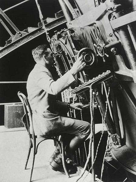 Edwin Hubble at the eyepiece of the 100-inch Hooker reflecting telescope, Mount Wilson Observatory, photograph, 1922 (media.npr.org) 