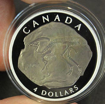 Canadian $4 coin with Parasaurolophus on the reverse