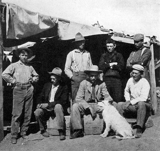 Dinosaur hunters from the American Museum of Natural History at Bone Cabin Quarry, Wyoming; Peter Kaisen is at right rear; Henry F. Osborn is seated at front center; photograph, 1899, AMNH archives (Wikimedia commons)