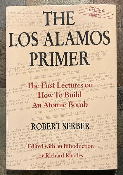 Detail of group photo of Shelter Island Conference, 1947. Robert Serber is the short man in the second row, just left of center, in front of the drapes; Hans Bethe, with the frizzy hair, is just to the left of Serber, in the rear; Robert Oppenheimer is the fifth from the right, in the second row; Richard Feynman is third from the right, in the rear, Institute for Advanced Study archives (albert.ias.edu)