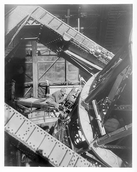 Francis Pease at the eyepiece of the 100-inch Hooker Telescope, Mount Wilson Observatory, photograph, undated but ca 1920, Huntington Digital Library (hdl.huntington.org)