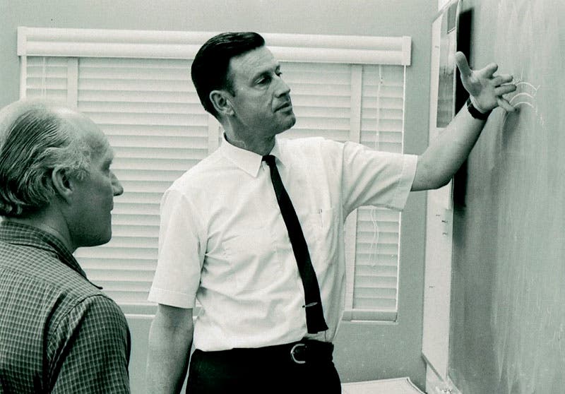 Robert Christy at the blackboard at Cal Tech, 1970 (atomicheritage.org)