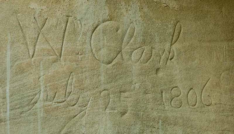 William Clark’s signature and the date, July 25, 1806, carved into the rock at Pompey’s Pillar, Montana (visitmt.com)