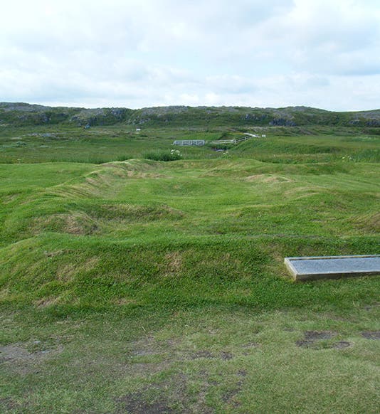 Remains of one of the 8 Viking buildings at l’Anse aux Meadows, discovered by Helge Ingstad and Anne Stine (Wikimedia commons)
