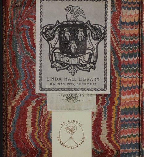 Bookplates of Linda Hall Library and Herbert McLean Evans, with a third bookplate beneath, inside front cover of our copy of Isaac Newton, Opticks, 1704 (Linda Hall Library)