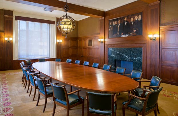 The board room at the National Academy of Sciences, with the Herter group portrait over the fireplace (National Academy of Sciences)