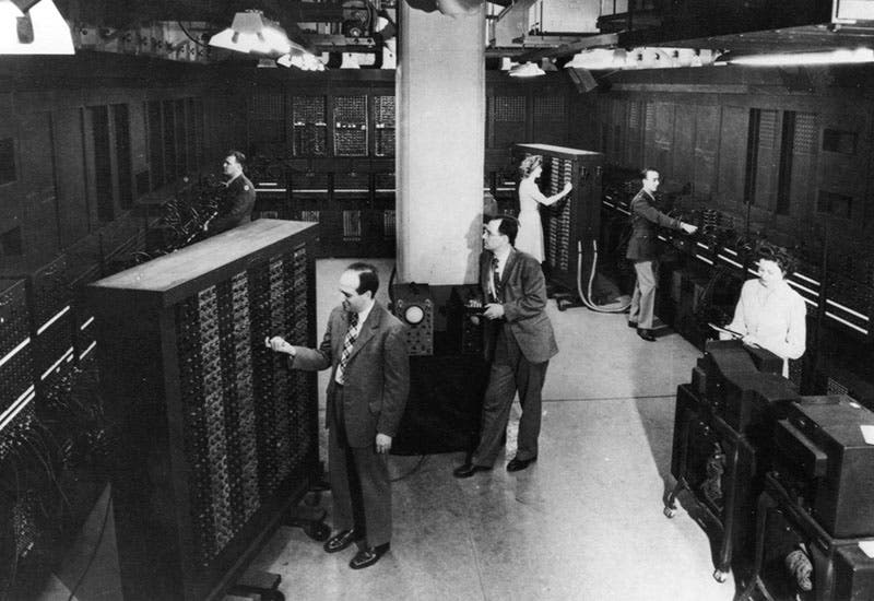 ENIAC at the Moore School; J. Presper Eckert is left foreground, John Mauchly is just to his right; photograph, ca 1946, University of Pennsylvania Archives (seas.upenn.edu)