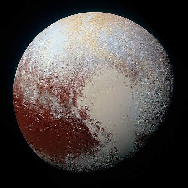 Pluto, imaged by the New Horizons spacecraft, 2015 (NASA via Wikimedia commons)