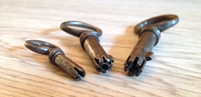 Three keys to Bramah locks, with many fewer slots than the key to the Challenge Lock, private collection (medievaljourney.com)
