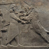 A sculpted relief depicting Ashurbanipal killing a lion, ca 640 BCE, one of many reliefs from the North Palace of Nineveh, excavated by Hormuzd Rassam in 1853-54 and sent back to the British Museum, where an entire room is now devoted to their display (Wikimedia commons)