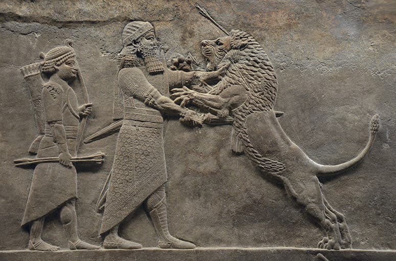 A sculpted relief depicting Ashurbanipal killing a lion, ca 640 BCE, one of many reliefs from the North Palace of Nineveh, excavated by Hormuzd Rassam in 1853-54 and sent back to the British Museum, where an entire room is now devoted to their display (Wikimedia commons)