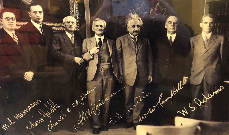 Milton Humason (far left), Edwin Hubble (next to Humason) and Albert Einstein in a group photograph in the Hale Library in Pasadena, 1931 (pbs.org)