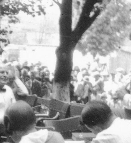 William Jennings Bryan (seated at left) being cross-examined by Clarence Darrow (standing), trial of John Scopes, July 20, 1925 (detail of photo by Watson Davis, Smithsonian Institution Archives, here via Wikimedia commons)