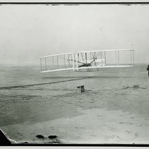 The first flight of Flyer at Kitty Hawk, Dec. 17, 1903, with Orville on the wing and Wilbur on the ground, National Air and Space Museum, Smithsonian Institution (airandspacd.si.edu)