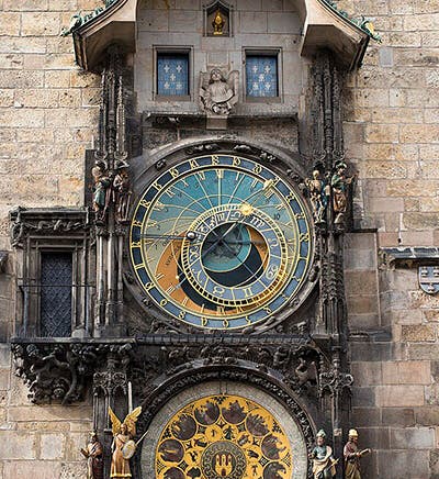 Prague Astronomical Clock, Clock Tower, Old Town Hall, Czech Republic; the astrolabe dial is in the center, the calendar dial below, and the windows for the apostles above, photograph by Steve Collis, 2012 (Wikimedia commons)
